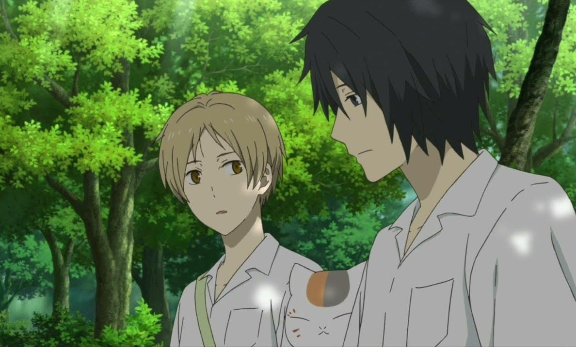 natsume looking at tanuma wonderingly while nyanko-sensei is squished and content looking in the middle.